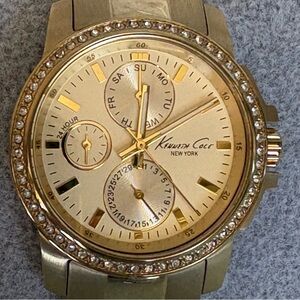 Kenneth Cole Gold Toned Sparkling Crystal Bezel Multi-Function Bracelet Watch